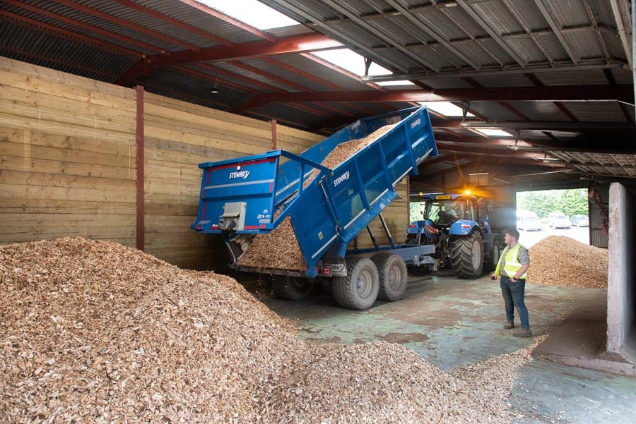 Unloading Woodchip Into Storage For Heating At Hadlow Place Farm.