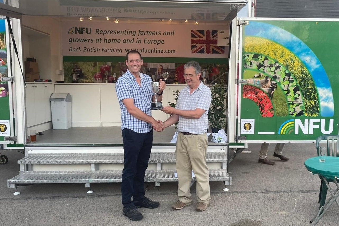 Hadlow Place Farms manager accepting award